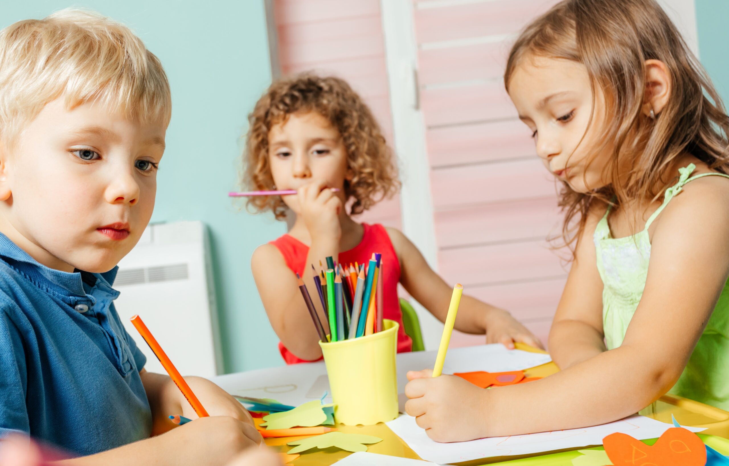 Preschool children learn english alphabet using cards